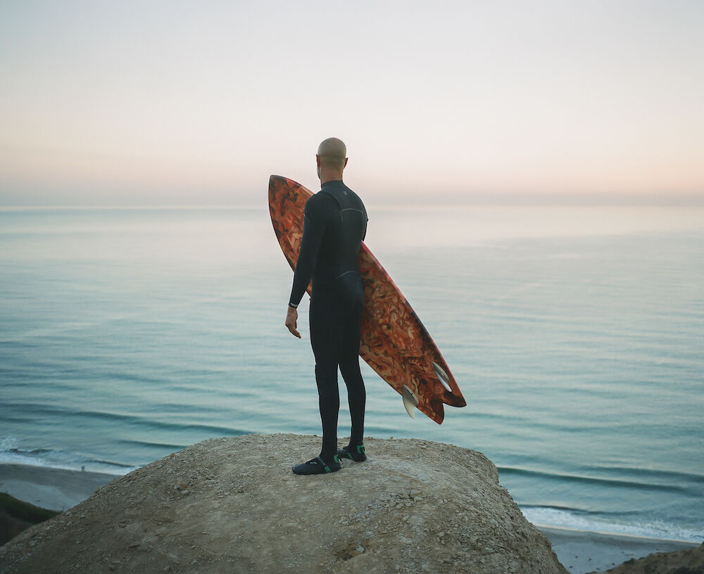 Dawn Patrol surfers - horizon